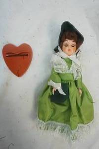 lot 367 image: 7 Vintage Doll in Green Dress