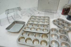 lot 388 image: Bakeware, Cup Cake Pans, Cooling Racks, baking dish