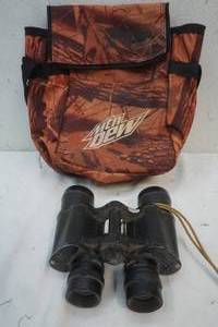 lot 439 image: Cost to Cost Binoculars & MTN Dew carry bag