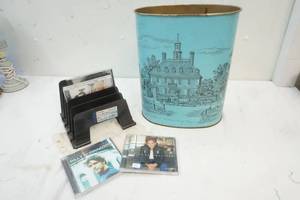 lot 682 image: Vintage tin, CDs and stacking accessory
