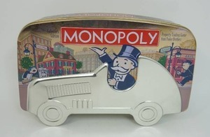 lot 34 image: Vintage Collectible Game of Monopoly 2001 Collectors Edition in a Tin...