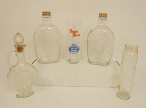 lot 108 image: Collectible Bottles Log Cabin Flash, Vintage Jungle Queen Riverboat Glass, Decanter Avon Skin So Soft Glass Decanter with Stopper