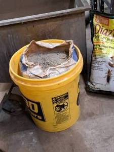 lot 231 image: Plastic Bucket with One Bag Concrete Mix