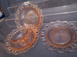 lot 61 image: Pink Depression Open Lace Dishes