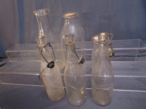 lot 132 image: Vintage Bottles Milk, Flip Top