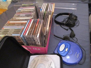 lot 223 image: Music CDs, Player, Holder