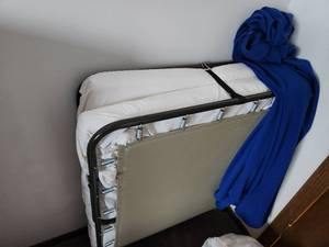lot 49 image: Twin Size Roll Out Bed with All the Bedding