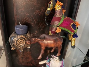 lot 123 image: Small Handcarved Ox, Vintage Ceramic Elephant Votive Candle Holder, & Handmade Unbranded Vintage India Folk Art Hose Hand Woven Fabric