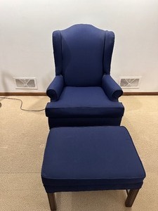 lot 106 image: Blue Uphostered Wing Back Chair with Ottoman