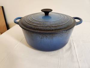lot 215 image: Well Loved Le Creuset in Blue Covered Casserole
