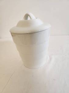 lot 216 image: White Canister
