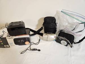 lot 285 image: Lot of Digital Cameras and Desk Alarm Clock