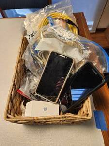 lot 318 image: Variety Box of Old Cell Phone Accessories and Jitterbug Smartphones