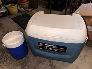 lot 478 image: Igloo Maxcold Premium 62 Quart Roller Cooler and Igloo 2-Gallon Sport Beverage Cooler