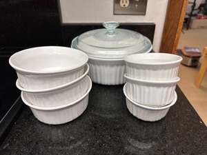 lot 191 image: Corningware French White Stoneware 1.5 Qt with Lid and Two Sets of 4 Ramekin Dishes -1-16oz and 1-7oz