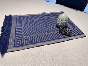 lot 323 image: Blue Hand Woven Table Runner, Bunny Egg Candle and Bunny Card Holder