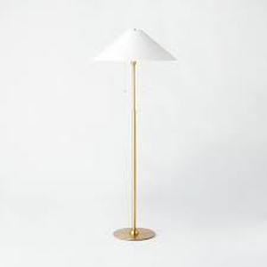 lot 6 image: Floor Lamp - Threshold designed with Studio McGee-Missing 1 Caster-Some Denting on Shade