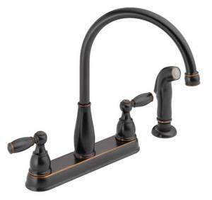 lot 27 image: DELTA Foundations 2-Handle Standard Kitchen Faucet with Side Sprayer in Oil-Rubbed Bronze