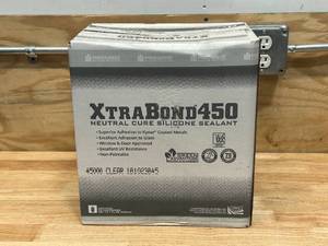 lot 29 image: PREMIER BUILDING SOLUTIONS Case of Xtra Bond 450 Neutral Cure Silicone Sealant- Clear (24 tubes)