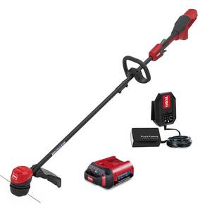 lot 110 image: TORO Flex-Force Power System 60V Max Lithium-Ion Brushless Cordless 1315 Inch Electric String Trimmer with 2.0Ah Battery and Charger