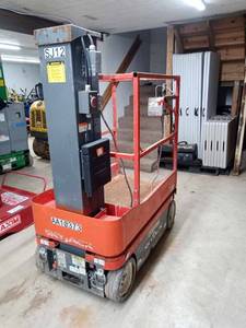 lot 20 image: 2013 Sky Jack Model SJ12 Vertical Mast Man Lift