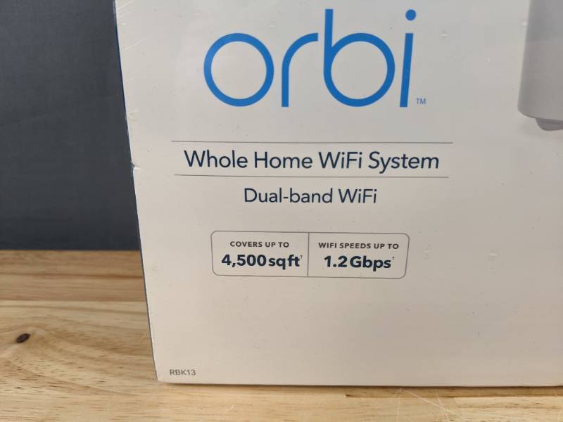 lot 77A image: Brand New NETGEAR Orbi RBK13 AC1200 Mesh WiFi System with Router and 2 Satellite Extenders O