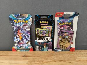 lot 31 image: Brand New Pokemon Knock Out Collection Booster Packs and (2) Pokemon Scarlet & Violet Paradox Rift Booster Packs  I