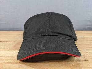 lot 50B image: 12 Brand New Advantage Series Ltd. Black and Red Hats OSFM A