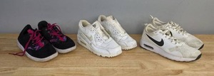 lot 132 image: Three Pairs of Nike Shoes Kids Youth Size 6 and 6.5 K