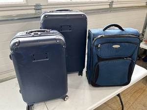lot 84 image: Tommy Hilfiger and Samsonite Rolling Luggage Lot of 3