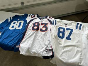 lot 91 image: Lot of Three 2XL NFL Officially Licensed Jerseys