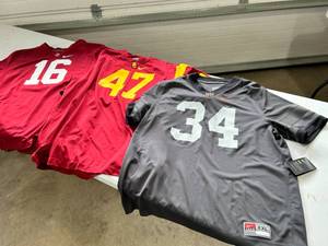 lot 93 image: Lot of Three Officially Licensed NCAA Football Jerseys - 2XL