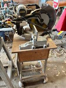 lot 43 image: DeWALT DW716 Double Bevel Compound Miter Saw - Fully Functional - Includes Stand -