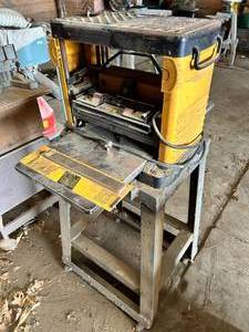 lot 44 image: DeWALT DW733 12-12-Inch Portable Thickness Planer - Fully Functional - With Stand -