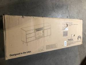 lot 31 image: 60 in. Dark Walnut Composite TV Stand with 2 Drawer Fits TVs Up to 66 in. with Electric Fireplace by Welwick Designs   Customer Returns See Pictures