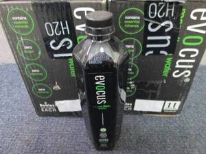 lot 122 image: 12- 16.9 oz Bottles Evocus Black Al...