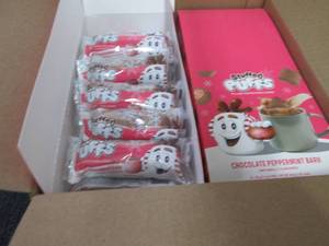 lot 290 image: 4- 12 pks Stuffed Puffs Chocolate P...
