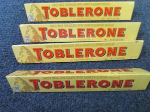 lot 334 image: 4- 3.52 oz Toblerone...