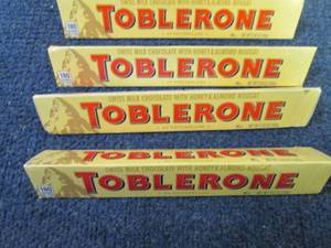 lot 336 image: 4- 3.52 oz Toblerone...