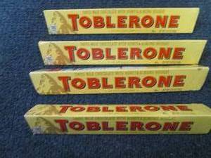 lot 337 image: 4- 3.52 oz Toblerone...