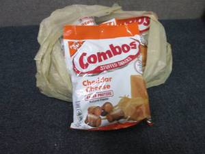 lot 342 image: 4- 13.50 oz Combos Cheddar Cheese...
