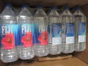 lot 370 image: 12- 1.5 liter Fiji Water...