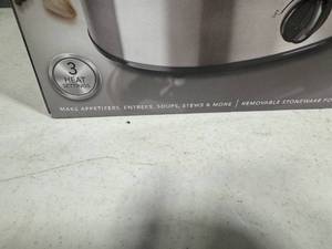 4 Quart Slow Cooker with removable oven-safe stoneware. New in Box.