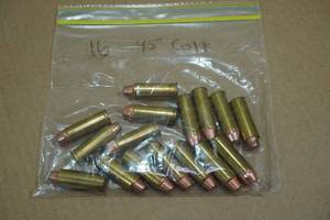 lot 174 image: 16 Reloaded .45 Colt FMJ FN Ammo