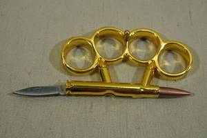 lot 61 image: Rifle Bullet Paper Weight and Letter Opener