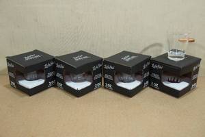 lot 127 image: 4 Shot Glasses with Embedded Bullets