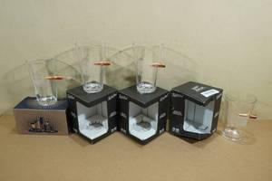 lot 131 image: Pint Glasses with Embedded Bullets