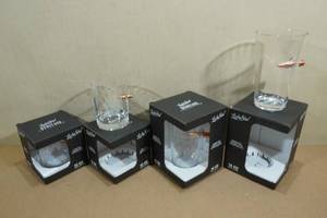 lot 134 image: Rocks and Pint Glasses with Embedded Bullets - 2nd Amendment