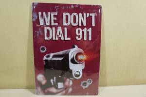 lot 138 image: We Dont Dial 911 Novelty Metal Sign