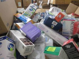 8-10 gallon metal  can full of assorted retail OTC overstock products (products filled at random and may vary from pictures)